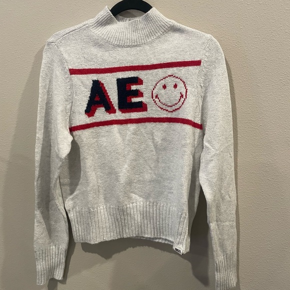 American Eagle Logo Smiley Face Graphic Mock Neck Sweater - Picture 4 of 5